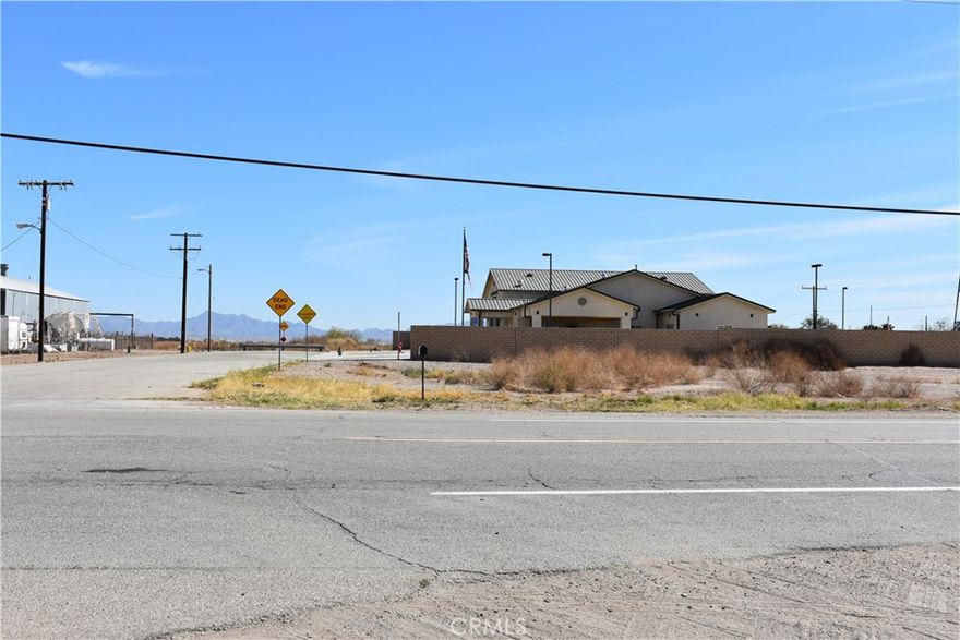 This is a nice flat lot approx 158X96, located on Hwy/State Route 78, Buyer to do their due diligence to verify that services are located adjacent to the property. The county of Riverside building is located behind this lot, it is approximately a 15-minute drive to the Colorado River where you'll find camping, watersports, and wildlife. Blythe has a diverse agriculture industry and the Arizona state line is just over the river!