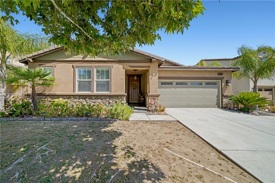 Welcome to this stunning upgraded single-story turnkey home located in the highly sought-after Audie Murphy Ranch community in Menifee. This beautiful residence offers a perfect blend of functionality and style, designed with meticulous attention to detail. As you step inside, you will be greeted by the timeless elegance of the tile flooring that seamlessly flows throughout the main living areas. This floor plan creates a welcoming atmosphere, ideal for both entertaining and everyday living. The heart of this home is the upgraded kitchen with open floor plan, which is a chef's dream come true. Adorned with high-end finishes such as granite counter tops, stainless-steel appliances, including a double oven, microwave, dishwasher and refrigerator. There is also a walk-in pantry and granite Island that can fit 8 people comfortably. It is sure to inspire culinary excellence. The custom cabinetry provides plenty of storage options and have self-closing draws, while the stylish backsplash adds a touch of sophistication. This home has 4 spacious bedrooms and 2 upgraded bathrooms. The interior is complemented by the timeless beauty of plantation shutters which adds $15000 to the home and is offering privacy and light control throughout the home. These elegant window treatments add a touch of class and enhance the overall aesthetic. The front yard got a brand-new sprinkler system, and the lawn has been seeded so new grass can come in. You will be delighted by the lush but low maintenance landscape inclusive of 100 perfectly placed palm trees and succulents. They create a serene outdoor oasis, perfect for relaxation and outdoor entertaining. Don't miss the chance to make this exquisite property your new home.