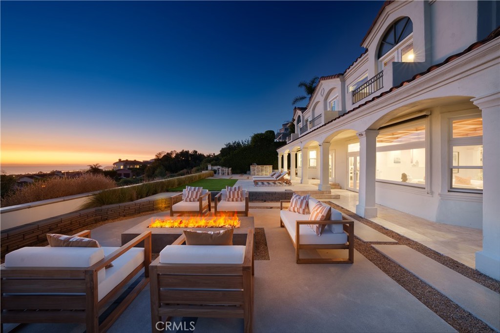 This stunning ocean view home captures miles of breathtaking, uninterrupted coastline views as far as the eye can see. Located in the prestigious gate-guarded Sea Pointe Estates, This home boast timeless elegance only rivaled by boutique hotels ,with its grand marble entry foyer and Jaw dropping ocean views from almost every room in the house, this estate is a rare find for someone craving unobstructed ocean views.Marble fireplace family room looks out to an unobstructed ocean view . A main floor office with gorgeous custom built-in bookcase and ocean view makes work at home a joy.The recently, professionally remodeled oversized kitchen with quartz countertops, handmade tiles on backsplash and new, white shaker cabinets, 2 Wolf ovens, stove and microwave. Wine bar and sit-down island opens to a relaxing family room with wood inlaid ceiling and large fireplace Bright sunlight fills the room along with an amazing view through new windows.Two sets of double doors lead to the relaxing outside professionally designed patio with built in firepit, and large barbeque area - a perfect place to take in the amazing views.
Upstairs, you'll find an enormous bonus room with floor to ceiling ocean views, 2 outdoor terraces, fireplace and bar with granite top for family gatherings. Also located on the upper level are two large suites as well as the master with his/her walk-in closets, fireplace, dry sauna marble countertops and outdoor balconies to soak in the views.This home has a newly relined and refreshed roof , new windows , garage doors , new openers as well a a new epoxy floor.and paint. The landscape has a new easy care artificial turf
Two large suites as well as the master with his/her walk-in closets, fireplace, dry sauna marble countertops and outdoor balconies to soak in the views. Community amenities include clubhouse, tennis courts, pool and spa.