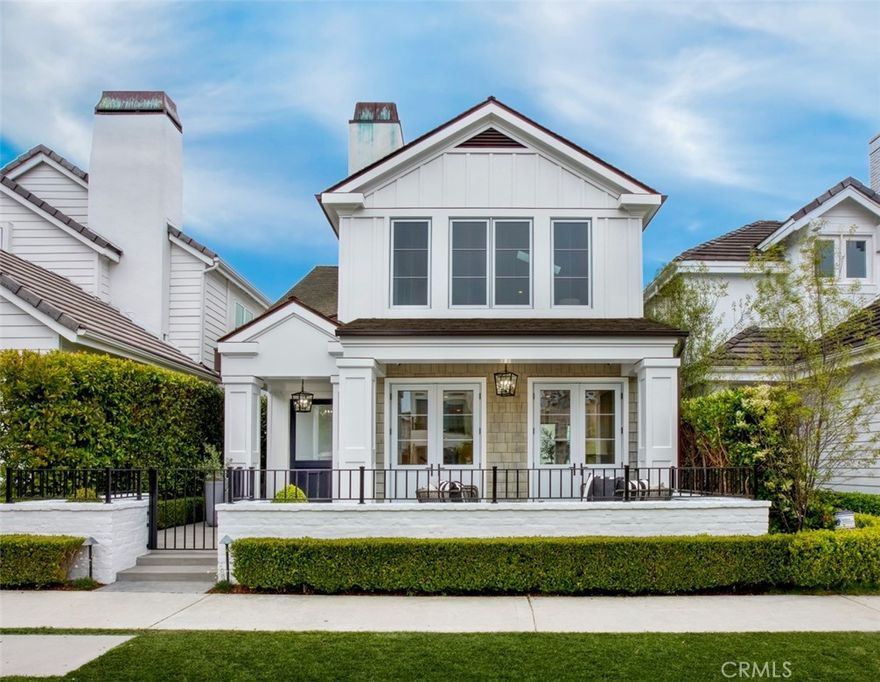 This meticulously remodeled home in the highly sought-after Flower Streets of Corona del Mar offers an ideal coastal lifestyle just blocks from the beach. As you step inside, natural light fills the curated living spaces, including a refined living room with French doors, a smooth coat fireplace with a reclaimed wood mantle, surround sound, Frame T.V., and touch-control window shades that lead to a large front patio, seamlessly blending indoor and outdoor living. The entertainer's kitchen is a chef's dream, featuring luxurious Carrara marble countertops, top-of-the-line appliances, a walk-in pantry, and an expansive marble island, all complemented by Fleetwood doors leading to a private, spacious outdoor patio. Wide plank oak floors, custom window coverings, and high ceilings exude timeless elegance throughout the home.

Ascend the front staircase to discover the primary suite, a serene sanctuary boasting a spa-like bathroom with warm Calcutta marble, Kalista fixtures with nickel finishes, as well as a large soaking tub offering a tranquil retreat with ocean breezes. Additional spacious bedrooms and a light-filled office provide comfort and privacy for family and guests. A versatile bonus room offering high ceilings, a built-in bar, touch control shades, and a wall of windows overlooking the coveted flower-lined landscape, offering both functionality and luxury. The home, curated by acclaimed interior designer Barclay Butera, also offers parking with a two-car garage and an additional space for a third car.

Embrace the Corona del Mar lifestyle where top-tier dining, shopping, and entertainment are just steps away from this exquisite residence, representing the epitome of sophisticated coastal living in Corona del Mar, just a stone's throw away from the beach.