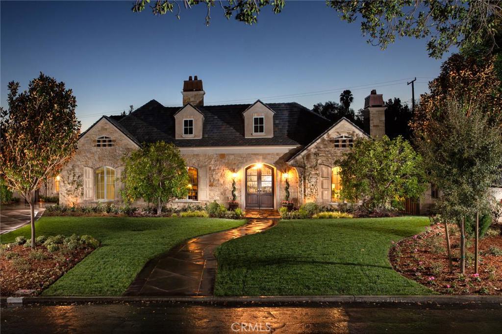 Stunning New Construction Single Level French Normandy Grand Estate featuring 6555 sqft of exquisite design finishes & fixtures. Developed by local and prominent Developer, Dexter Development and Designed by the reputable Robert Tong. Located in Arcadia’s prestigious Lower Rancho neighborhood along mature tree-lined winding streets. This exquisite home boasts marble & wood framed entryways encompassing massive views from every angle. This grand estate is designed from the ground up and features 5 full suite bedrooms and 5 1/2 baths including a grand master suite with private sitting area. Enjoy views from the 600 foot Guest pool and guest house. Private open center loggia with fire place offer comfort and serenity for the most discerning gatherings. Private formal dining room and adjacent formal sitting area encompass premiere finishes and designer details. Unique one of a kind remote controlled family room skylights. Custom home theater is visually and acoustically designed and exceeds the highest quality experience. Stroll the length of your own private art gallery displaying your works of art. Master Wolf and Sub Zero chefs kitchen encompasses the finest equipment and is a culinary artists dream with adjacent master prep room with separate appliances.