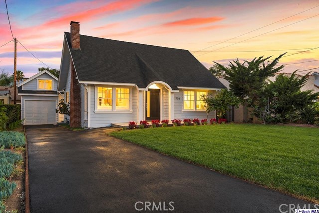 Picture perfect Pasadena! Warm, beautiful and bright, this 2bed/2bath charmer also boasts over 500 sq ft of usable bonus space including a HUGE finished attic AND expansive space for a creative retreat /studio above garage w/ separate entrance! The chic, clean feel throughout the home, inside and out will grip you from the moment you pull into the new long driveway and roll past the green, grassy lawn. Inside, hardwood floors, crown molding, and LED recessed lighting lead you through the open-concept living area with historic Batchelder fireplace and into the open modern-kitchen with quartz countertops, stainless steel appliances, farmhouse sink, and all-new cabinetry. The master bedroom sports a walk in closet and spa-like ensuite bathroom featuring a dual-sink vanity with Italian Carrara marble, and french doors that open up to the custom built deck overlooking the backyard. Expect every upgrade: from the Nest thermostat system to copper plumbing throughout. In the shadows of the Eaton Canyon hillside, the picturesque NE pasadena neighborhood flows effortlessly to whatever your day has in store, whether it's exploring the Angeles National Forest trailheads or a day of nearby Old Town Pasadena culture!