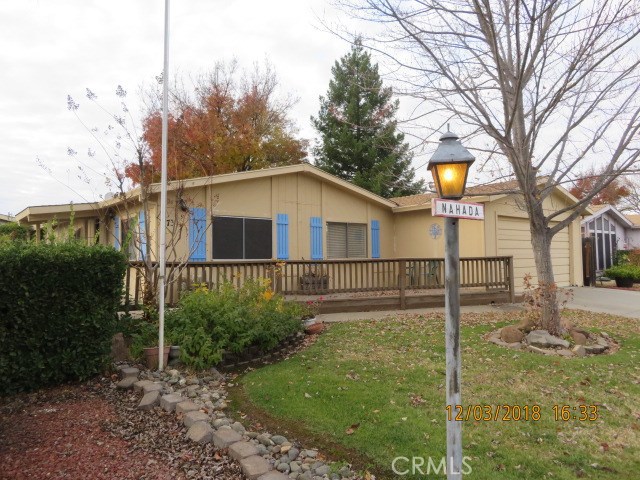 Manufactured Home located in a Senior Park near the Sacramento River. Home features wood deck front and patio in back. Fenced back yard with storage shed. Woodson Bridge Estates features a Club House for special gatherings, pool and jacuzzi. Park rent includes, sewer, water & garbage. Buyer must apply with park manager and be approved prior to completing any sale.