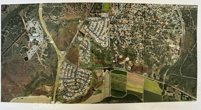 Public Remarks: **Developers Opportunity: Prime Land for Housing Project!** 18.32 Acres Available! Zoned for DR-4.6 or Agricultural Land Use** Located beneath the picturesque Mesa Oak Area - Ideal for Housing Development** Are you looking for the perfect location to build your next housing project? Look no further! This 18.32-acre parcel of land boasts zoning for DR-4.6 and is designated for agricultural use, offering a unique opportunity for developers.