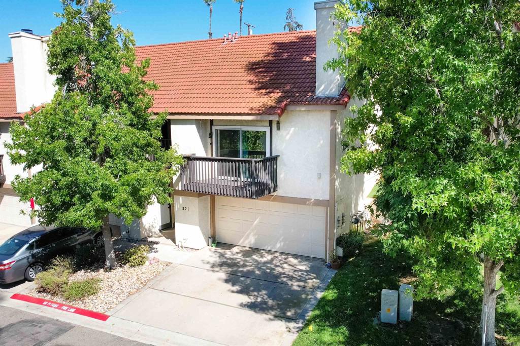 Upgraded end-unit condo with ATTACHED 2-car garage! Located in the highly sought-after community of Vista Knolls, this 1bedroom/1bathroom end-unit home has so much to offer! Featuring grand vaulted ceilings, dual-pane windows, new laminate flooring, custom baseboards, fresh Benjamin Moore interior paint, and upgraded kitchen appliances, this home is move-in ready! Gas fireplace in living room creates cozy atmosphere. Stylish new light fixtures spotlight the dining and kitchen area. Covered rear patio space is perfect for entertaining or relaxing! Oversized, attached 2-car garage offers plenty of additional storage! Furnace replaced 2017, and A/C was recently serviced in 2019! Enjoy the community pool & spa this summer and all year 'round! Conveniently located within walking distance to Vista Village dining, shopping, and entertainment. Washer/Dryer included & located in garage.