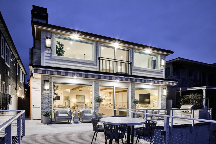 A refined collection of spaces capturing the idyllic sights and sounds of an iconic location. Set along the Nord of Lido Isle – one of the region’s most-desired enclaves, this bayfront residence and its exterior surround were just completely reimagined to reflect an elegant and modern – yet delightfully comfortable environment. Captivating views of the wide waterway, main turning basin, and sparkling skyline present an ever- changing panorama from the 40 feet of unobstructed frontage. Both levels of the over 3,900 square-foot dwelling are crowned by near property-width walls of windows affording a beautiful palette of diffused light throughout the home, and spectacular views from the main living areas. The three bedrooms, four baths, and generous rooms for dining, entertaining, and relaxation are all finished with impeccable quality and a fresh, yet enduring aesthetic. Every consideration was made to open and enhance the property through both fine materials and precision construction execution. A small selection of interior appointments and technological components includes – abundant use of stones and hardwoods; raised and recessed square wall paneling; finish carpentry of rift white oak throughout the entire home; the addition of white oak beams; new Town &amp; Country fire places with stone surrounds; a reconfigured stair and custom

railings; designer lighting, wall coverings, and Sofi-controlled window treatments; Nickel

and brass fittings and fixtures; Wolf, Sub Zero, and Perlic kitchen and bar

accommodations; Waterworks and spa-like bath elements; new HVAC; home security;

and wired Sonos sound system. The outdoors, with equivalent attributes, are

complemented by a rare extended waterfront terrace clad with Belgard Italian pavers;

Western cedar soffits; copper gutters and water divertment; surveillance cameras; and a

new custom boat dock with Pro Fender wrapped carpet fenders and berthing capacity

for an up to 60’ craft. Further distinguishing the offering – a commercial grade elevator

and three-vehicle garage space, both fully-finished with porcelain and stone flooring;

paneling and Quality first woodworks millwork; along with the optimal proximity to

regional amenities, Lido Village, and the recreation opportunities of the Newport Harbor.