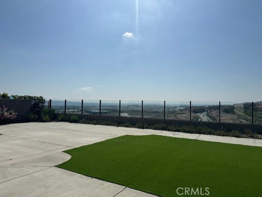 View! view! view! Stunning city lights view will blow up your mind! This 5200 sqft nice home Nested in a gated community Oaks by builder Baldwin and son. This was original Plan 7 with Contemporary architectural style and a huge balcony attached to master bedroom with wonderful city lights view and even a peak to Newport beach.