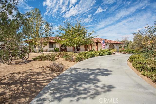 Horse Lovers look no further this one has full set up just unload your horses and move your furniture. Fenced and cross fenced. Large circular driveway with wrought iron gate in front, backyard has multiple sheds, 60 ft round pen, 2 corrals (24x36) with shelters, wash rack, hay barn plus a large side turn out. Home shows amazing with pride of ownership. Interior of home has upgraded flooring throughout, large kitchen with plenty of counter space. Living room has brick fireplace gives it that at home cozy feel and great to warm you up on those cold winter nights. Entertainers area with a bar, home has storage everywhere. This home has it all and will sell fast so call your agent today for a showing. Association Amenities: None # of RV Spaces: 0 Special Features: CO,SHNONE Lot Location Type: Standard Location # of Attached Spaces: 3 # of Detached Spaces: 0