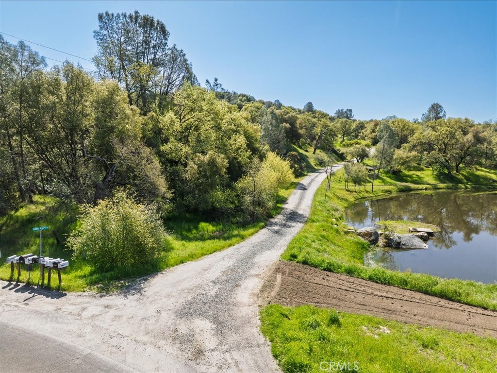 This incredible property offers everything you could want in a countryside escape—over 25 acres of gently rolling hills covered in native grasses and framed by beautifully spaced white oaks. With easy access off a well-maintained gravel road, on-site power, and all the privacy you need, this land is ready for your vision. Zoned Mountain Home with land division potential, the possibilities here are endless. Whether you're looking to build your dream home, establish a private horse haven, or explore development options, this property gives you the flexibility to make it your own. You're just outside the boundaries of Broncho Hollow Estates, which means you enjoy the benefits of the community without being subject to its restrictions. One building site has already been established, complete with a circular driveway and sweeping views of the surrounding landscape including the pond on the neighboring parcel! It's the perfect foundation for whatever you dream up next. This land offers both peace and potential—a rare combination that's hard to find.
Call today to schedule your private tour. Don’t miss your chance to own a piece of paradise!