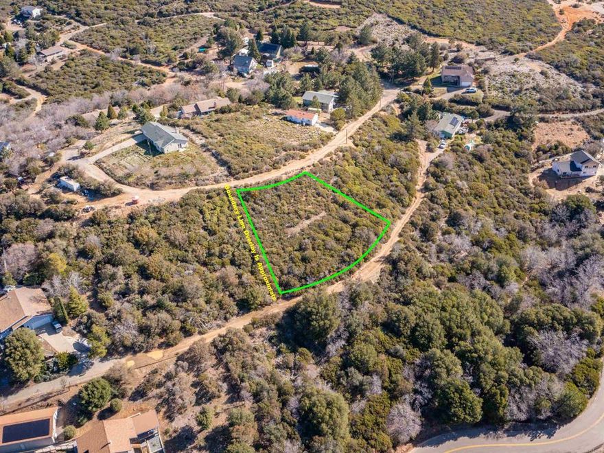 Nestled in the quaint and desirable Kentwood neighborhood of Julian, this 0.36+/- acre parcel offers an excellent opportunity to build your custom mountain retreat. Ideally situated between Mountain Circle Drive and Hawthorne Drive, this prime lot enjoys a peaceful setting with a sense of openness and privacy. Gentle topography and lovely views of the surrounding hills, wooded terrain, and neighborhood below create a serene atmosphere, perfect for designing a home that blends with the natural beauty of the region. With water meter and power availability, plus an existing septic layout and civil engineering workups already in place, much of the groundwork has been done—streamlining the path toward your vision. A recent lot merge enhances the usable footprint, making the property even more conducive to a spacious home design or outdoor living features.  Conveniently located just minutes from Julian’s historic town center, you’ll enjoy easy access to local shops, dining, schools, and seasonal attractions, while returning home to the tranquility of this established residential enclave. Whether you're seeking a full-time residence or a part-time escape, this ready-to-build lot combines charm, utility, and potential in one of San Diego County’s most beloved mountain communities.