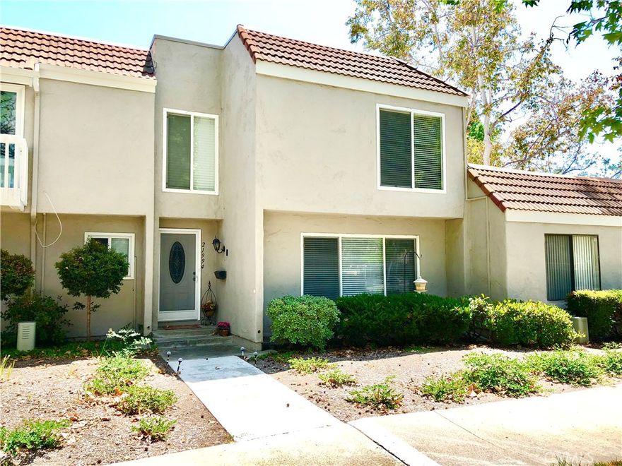 Lovely updated home with great lodging floor plan. The kitchen features updated cabinets, granite counters with light and bright ambience. The living room is spacious and features newer laminate flooring that encompasses the the stairs as well. Other features are an updated hall bath, newer dual pane window, front door and patio slider door. You are close to shopping, walking trails schools and of course you have a membership to the coveted Lake Forest Sun & Salil Club right across the street!