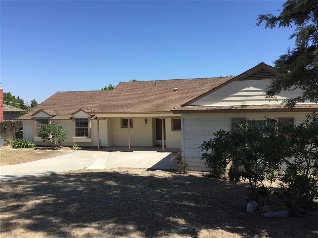 This 4 bedroom home has an open floor plan with a cozy family room with wood floors. The kitchen opens to the dining room with a slider to the outside. The bathrooms are recently upgraded and the bedrooms have newer paint and carpet. This home has tons of potential for entertaining in the backyard. It includes a two car garage and is located on a cul de sac. Convenient location to schools, shopping and Lake San Marcos. Neighborhoods: San Marcos Sewer: Sewer Connected