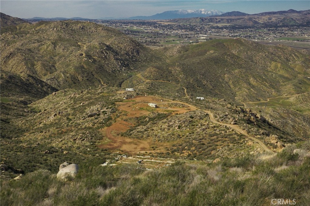 AMAZING property with breathtaking views of the valley and city lights below is now available! If living off grid has been a dream, then come take a tour of this flat 20 acre slice of tranquility. Water available and the sun can power the rest.