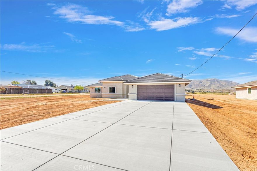 ***Stunning NEW Construction in Apple Valley***Just a few short feet from the Pavement**Natural GAS**Just under an acre of flat, usable land**Quartz Counter tops through-out***The Kitchen has a nice size Center Island & black Stainless-Steel appliance***Custom Light fixtures & Ceiling Fans**Plenty of Storage**Split Floor plan with 4 Spacious Bedrooms & 3 bathroom**Beautiful VIEWS all-around of the Mountains**Open Concept living**PAID SOLAR**This home will not disappoint**