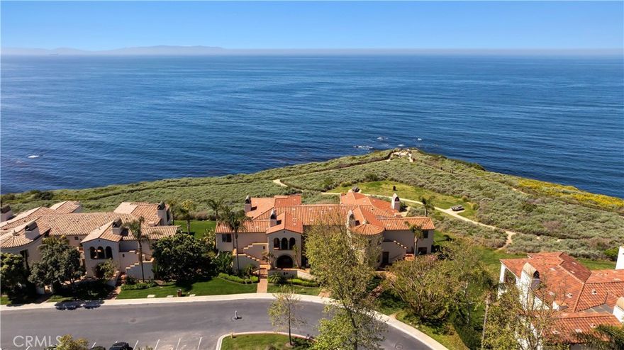 If you've been waiting, now is your chance: this is the ONLY Oceanfront Terranea Casita for sale! Gorgeous unobstructed ocean views are best part of this upstairs Casita. Relax to the sound of the waves crashing along the shore and the peaceful views of the Pacific and Catalina Island, renewing your spirit every time you return to your very own "beach house". This is fee-simple real estate, so owners have the Grant Deed and title, and because of the California Coastal Commission conditions, it is not a primary residence. The lucky owners may sleep here up to any 60 nights per calendar year, as it works with their schedule, and when they're not in residence, owners make it available for other resort guests to rent. Three individual suites are accessed independently through the covered courtyard, with its outdoor fireplace and cozy seating area, a favorite place for roasting s'mores. The owner owns all three suites, and guests may stay in one, two or three bedrooms on a nightly basis. This offers flexibility and the potential to rent to guests with various room requirements. The large main suite has the entry foyer, the kitchen and dining table, the great room with its fireplace and beamed ceilings, opening to the covered ocean view balcony. The primary suite has French doors opening to the balcony and another set with views of the ocean. The second suite can be accessed through the main suite, or independently through the courtyard. This creates a two-bedroom casita when the interior doors are opened. The second suite has two queen beds and an ocean view balcony. The separate third suite has a king bed, lots of natural light with windows on three sides plus an ocean view balcony. Beautifully designed & fully furnished, this casita is professionally managed by Terranea Resort. Owners enjoy full access to the Resort's six restaurants, 24-hour room service, four pools, The Links, a 9-hole par-three golf course, and of course the outstanding 50,000 sq. ft. Terranea Spa and fitness center at the edge of the ocean. Enjoy the hiking trails, the resort activities and the personal owners' concierge team. Everything is included to make your stays easy and comfortable, including insurance, gourmet kitchen appliances & cookware, dishes, and linens. Now is your chance to finally own the world's easiest vacation home, rental property and guest house within the award-winning Terranea Resort. These casitas are rarely available, so make an appointment to see it soon!