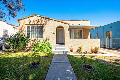 Photo of 1233 W 65th Place, Los Angeles, CA 90044 (MLS # SB24174870)