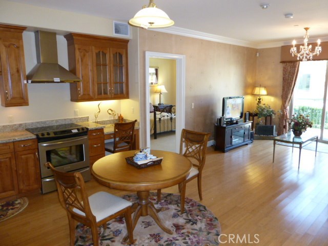 IVY GARDEN, LUXURY GATED SENIOR COMMUNITY! NO AGE RESTRICTION TO PURCHASE! 1st Floor Unit with One Carport Parking Space. Open spacious living room with high ceilings, Bamboo wood floors, upgraded carpet, kitchen with Granite counter tops, stainless steel appliances, dual pane windows, cable and security system ready. Most units offer private patio or balcony. Amenities includes: Grand Lobby, theatre, club house with indoor heated pool, spa, gym and multi-purpose room. Beautifully landscaped courtyard with Koi pond, putting green, BBQ and patio area. Walking distance to Medical Plaza, restaurants and shopping. Conveniently to 99 Ranch Market, Target, Walmart, Henry's Market and so much more. THIS COMMUNITY OFFERS A QUALITY LIFE STYLE.