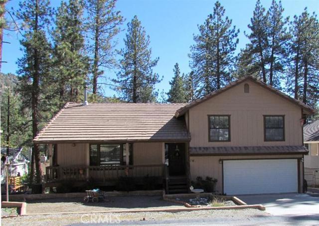 Beautiful, three story home in Wrightwood One owner, well maintained. Close to everything. see the virtual tour. Association Amenities: None # of RV Spaces: 2 Special Features: WKNONE Lot Location Type: Other Landscaping: Natural Patio and Porch Features: Covered Deck Basement: FINI # of Attached Spaces: 2 # of Detached Spaces: 0