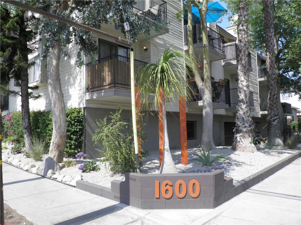 Enter into a inviting, intimate courtyard that leads to this beautiful townhouse style condo. Walking through the front door you first notice the maple hardwood floors that immediately add to the warmth of this elegant home. The wonderfully upgraded kitchen, with lots of natural light & recessed LED can lighting, boasts gleaming quartz counter tops, glass tile back splash, white cabinets, new brushed stainless steel sink/fixtures/appliances, decorative utility racks, & custom tile floor. The living room with a gas fire/ice fireplace, guest bathroom & welcoming balcony are all on the first level. Berber carpeted steps lead upstairs to the master suite, designer bathroom & yet another balcony. The 2nd floor skylight in the vaulted ceiling adds light & a feeling of openness while the custom light fixtures add to the peacefulness that is reflective of this home. Additional features include new kitchen plumbing, custom built cabinet over the in-unit laundry, new service panel w/additional power slots, & fresh paint throughout. Lush landscaping surrounds the complex creating an oasis like setting close to freeways, shopping & entertainment. The parking is in the secure subterranean garage. All this within a professionally managed complex that is FHA approved.