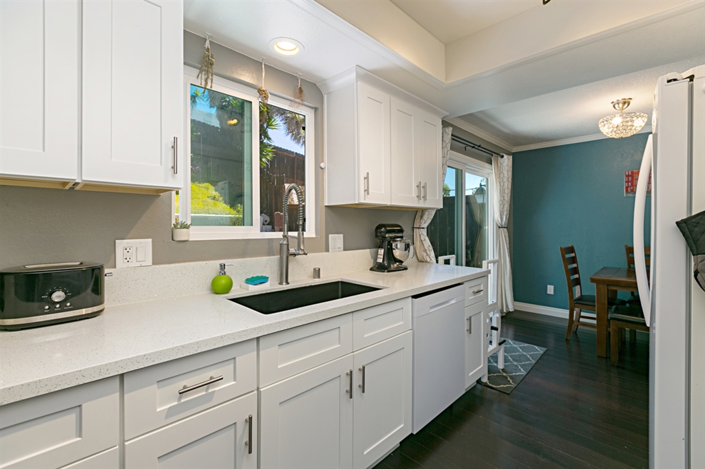 Amazing first-time buyer or investment opportunity! This beautifully remodeled townhome features a HUGE Master bedroom with peak ocean view plus large second bedroom, full bathroom upstairs and half bath downstairs, gorgeous kitchen with new appliances, newer woven bamboo flooring, custom paint, and private patio that is perfect for a BBQ or play. The location is incredible - VERY close to tons of new shopping and restaurants, Mira Costa college, beaches, businesses, and so much more. Neighborhoods: Fire Mountain Equipment: Range/Oven Other Fees: 0 Sewer: Sewer Connected Topography: LL