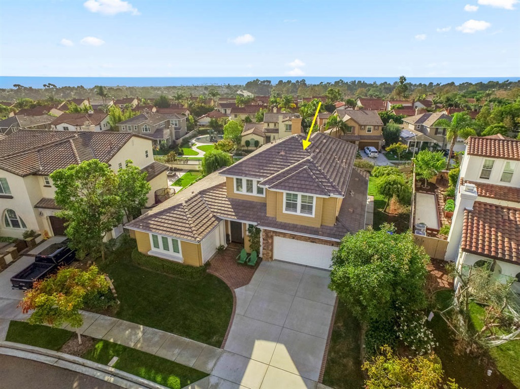 WOW!!! Located just 1 mile from the beach, this 12 year new OCEAN VIEW home boasts among the LARGEST LOTS in the neighborhood (nearly 1/4 acre). LIVES LIKE A SINGLE-STORY WITH MASTER BEDROOM ON FIRST FLOOR. Lovingly maintained by original owners. Capture AMAZING SUNSETS from the West-facing backyard!!! Features include hardwood flooring, granite countertops and backsplash, stainless steel appliances, built-in kitchen refrigerator, double oven, crown molding in living and dining rooms, built-in's in living room and in family room, plantation shutters throughout and jetted jacuzzi tub in master. Spacious bedrooms! LIVE THE LUXURY COASTAL LIFESTYLE!!!. Neighborhoods: South Carlsbad Equipment: Fire Sprinklers,Garage Door Opener Other Fees: 0 Sewer: Sewer Connected Topography: LL