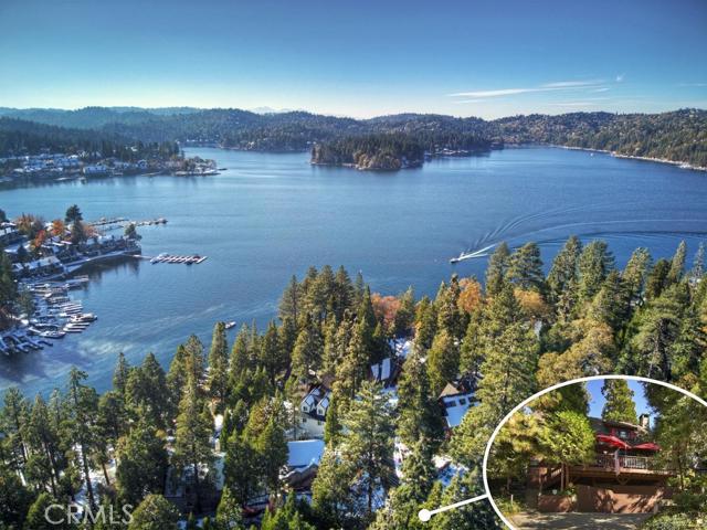 Hard to find First Tier vintage charmer. Located steps from ALA access trail on one of Lake Arrowhead's most iconic streets, this 3 bed 2 bath home has been lovingly maintained and updated and is ready for new owners. Classic features such as dutch door entry, T&G ceilings and walls, large stone fireplace and hardwood floors though out add to the warmth and charm of this home. Additional upgrades include attic and floor insulation, insulated pex plumbing, newer heating ducts and all steel windows. After your day on the water, enjoy the evening on your cozy front deck or the enchanting backyard patio with a relaxing water feature and hot tub. You really don't want to miss out on this Lake Arrowhead gem!