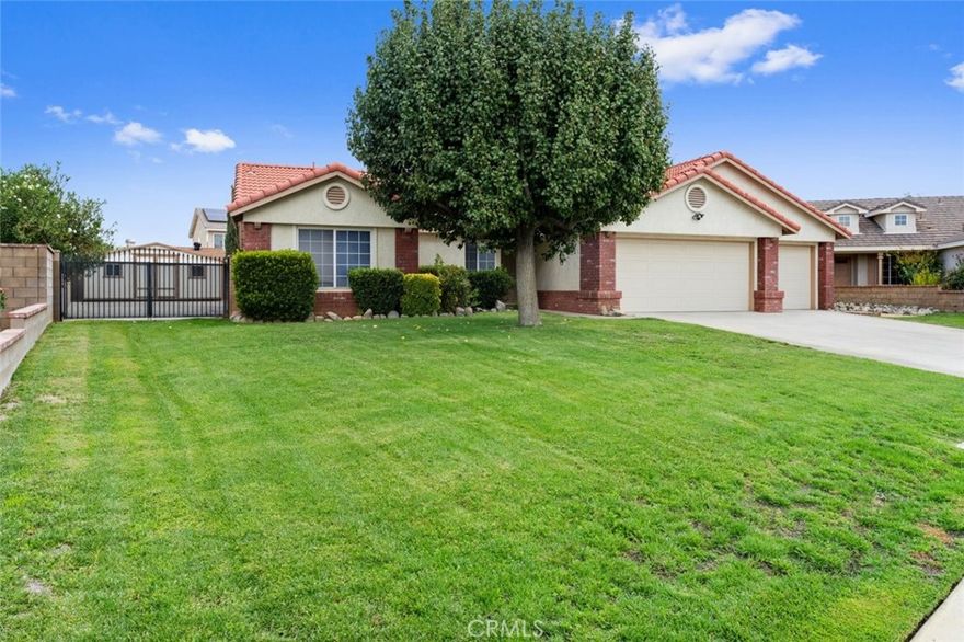 Nestled on a peaceful street resides a very desirable home located in Quartz Hill. This stunning single story home features 3 bedrooms, 2 bathrooms and an attached 2-car garage. The 3rd garage was converted into a bonus den/office. The updated kitchen is equipped with new SS appliances and Quartz countertops. Bathrooms have quartz countertops, as well as new toilets. The living room and all 3 bedrooms have ceiling fan/light fixtures. The property is beautifully landscaped. There is a large RV and storage shed, plus a very large patio where you can add seating. Located near Joe Walker Middle School, Arco, The Ravens Nest Restaurant, Quartz Hill High School and much more.