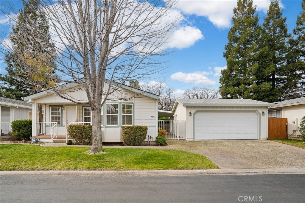 You are sure to be pleased when you step inside this beautifully upgraded home with newer flooring throughout, lots of cabinetry, and solid surface counters. SPRINGFIELD MANOR, a 55+, gated community is recognized as the finest senior park in Butte County. Residents enjoy the safe, tranquil atmosphere that this close, well-maintained community provides. The park's clubhouse amenities include an exercise room, billiards room, card room, and an outside pool and spa for residents and their guests. The home has a large master suite with a large walk-in closet. An individual laundry room. And for entertaining, there is a large patio covered by an upgraded, low-maintenance Powder-coated aluminum patio cover. The gated backyard has plenty of green grass for you and your pets to enjoy. Shopping & dining are close by. There are many planned events each month for residents who wish to participate. Pets are allowed with restrictions. Management approval is required for residency.