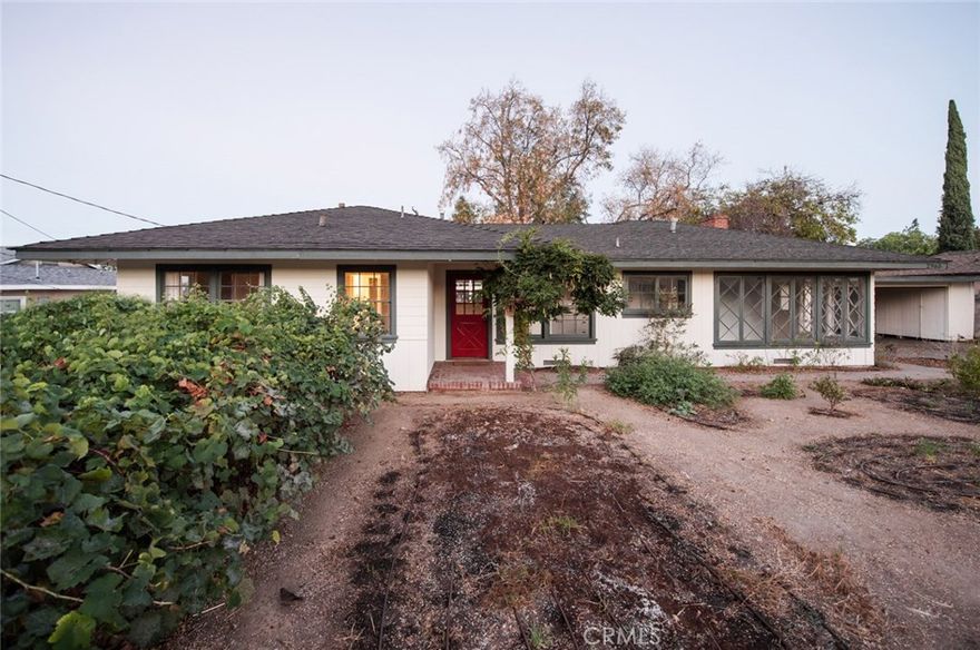 Contemporary Country Living. Well maintained mid-century ranch tucked along the Claremont foothills on nearly 1/3 acre of land. Enter into a beautiful entry room which makes a perfect sitting area or formal dining space. Open and bright updated kitchen with quartz counters a large farmhouse sink, stainless steel appliances, and a spacious breakfast nook engulfed with light from the numerous surrounding windows. Massive great room is divided into two parts featuring a family room with fireplace, and a large sun room which brings the outdoors in. Three bedrooms and two stunningly updated bathrooms with elegant appointments. Back yard features over twenty fruit trees, a livestock pen with chicken coop, and extensive deck/entertaining space. Convenient storage/workshop room adjacent to the roomy 2-car carport can easily be converted to an enclosed garage. Located in the desirable Condit Elementary School zone within the award winning Claremont School District.