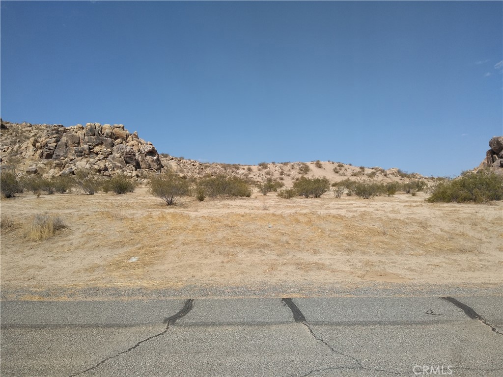 Nice commercial parcel fronting on main street of Lake Los Angeles. 3/4 acre with electric & water available, zoned Rural Commercial. Adjoining lot also
available. Seller will consider financing with a minimum 60% down for a term not to exceed 36 months. *Buyer to make their own independent investigations regarding Zoning & General Plan Designations, Hazard Zones, Availability & Costs of Utilities.