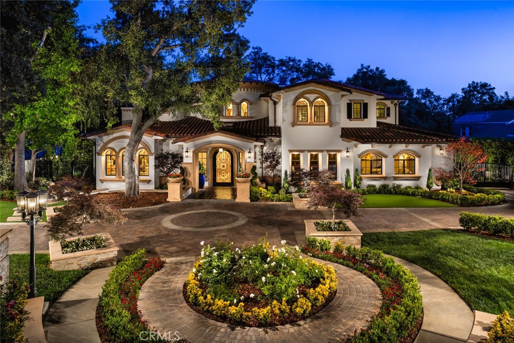 Magnificent 9800 square feet 7 bedroom 7 1/2 bath Brand New Construction, This breathtaking Spanish Architecture Located in Arcadia's Upper Rancho on one of the best streets, you know you have arrived at a very special residence. Huge circular drive is surrounded by perfectly designed landscaping & massive oaks. Designer wrought iron and glass door opens to the 28-foot ceiling with hand painted rotunda. Wide plank floors throughout are inviting. Immaculate finishes abound in the formal living & dinning rooms. The informal family room and open kitchen will be the center of interest. A private elevator whisks you to a floor adorned with art gallery walls, arched entrances and 6 en-suite bedrooms. A master suite with sitting area is an oasis. Rainfall showers, marble fireplace, pedestal soaking tub and dry sauna await your presence. Enjoy breakfast on your private patio with dual French doors encompassing views of the cascading waterfall, lush vegetation, pool, and pergola. This backyard is a 5 star resort. Dine alfresco every evening. Natural northern light highlights the home office/library with coffered ceilings. Two additional guest suites are on the main level. Experience all the amenities of a truly sensational resort with 3 car garage, dual laundry rooms, chefs dual kitchen, media room, etc. Arcadia Schools, close dining and shopping make this truly a place to relax and call home.
