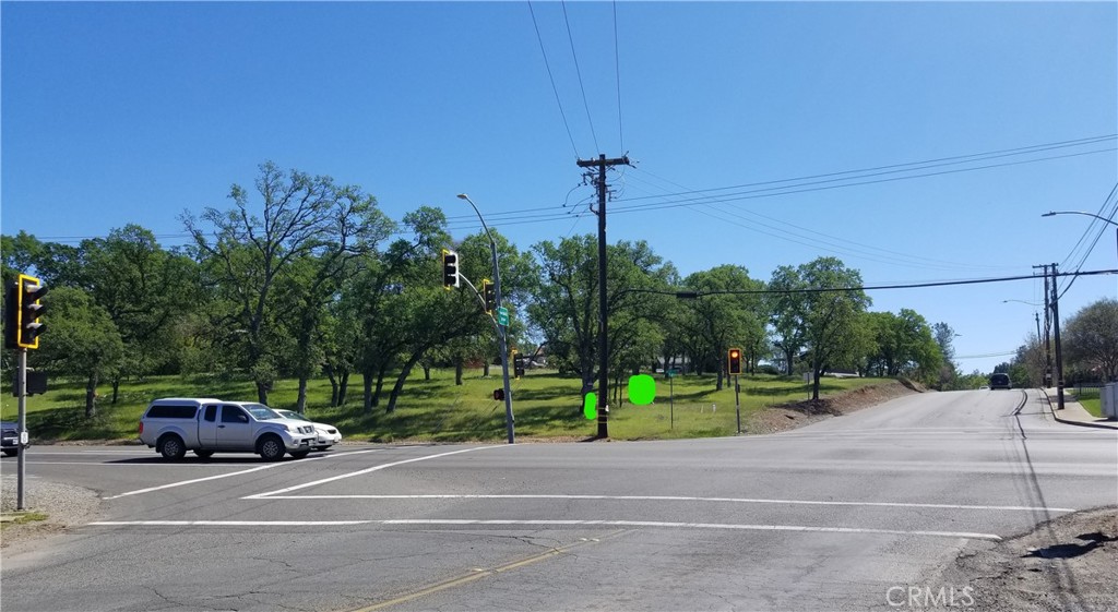 Location, location. High traffic count passes this Southeast Corner lot on Olive Hwy and Foothill Blvd. Zoned Mixed Use per City of Oroville. Fire hydrant on property and SFWP Water line on Foothill Blvd adjacent to the property. Approx 4 minute drive to Oroville Hospital Multi story New Surgery Center. Mixed use info in supplements.