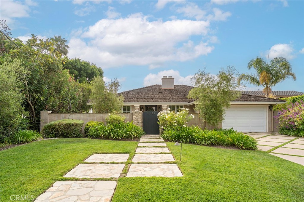 This Lunada Bay stunner is FULLY FURNISHED to allow you to travel through life light -- and settle right in! This 2,770-square foot home is ready and waiting for you on coveted Chelsea Road, a block from the bluffs, on a 10,883 sq ft lot with resort-like landscaping and pool. Remodeled from the foundation up, with custom details and luxury appointments throughout, this single-story executive-worthy home, with pecan/hickory hand-carved floors, has been impeccably designed and furnished by renowned designer Jim Sams. The gated entrance greets you to your private, sunny front courtyard with fountain and room to relax. As you step inside the home, you'll find it lives MUCH larger than it looks and has fabulous indoor/outdoor flow, with outside access from most rooms of the house. The spacious open-floor plan comprises the living room, designer custom kitchen, formal dining area, and library (or office) with Murphy bed. Gather with family or guests in the great room, with built-in cabinetry and bar, and 55-inch television. The living room features a gas-burning fireplace and peek-a-boo ocean views. 4 bedrooms, 4 bathrooms. The Chef’s kitchen features a large center island, beautiful granite tops, custom cabinets, all the appliances and dishes you'll need to dine and entertain:a GE Monogram Built-In refrigerator & freezer, a Wolf Professional 6 burner range, (extra GE Electric professional oven, microwave and butler’s pantry with refrigerator. Bonus for wine lovers -- a whisper-cool, climate-controlled wine room for approx. 250 bottles. When you're ready for rest, the master retreat has a large walk-in closet, a luxurious master bath and French doors that open to an elevated terrace. Two other spacious bedrooms are also ensuite, and have built-in desks and walk-in closets. The 4th bedroom (or office) has a Queen-sized Murphy bed and built-in shelves, desk and files to keep you organized. Stepping back outside, the rear patio provides loads of privacy, with infra-tech heaters and a wonderful table for dining alfresco. The comfortable outdoor furniture, salt-water pool and jacuzzi are the finishing touches on what is like living at a 5-star resort. An attached 2-car garage. Surround-Sound inside and outside, A/C, monitored security. Located right by the bluffs of Paseo del Mar, Close proximity to all 3 PV award winning schools and Lunada Bay shops and restaurants. Owner pays for Water, Pool Service and Gardner! A aprox $1,000 credit to tenant!