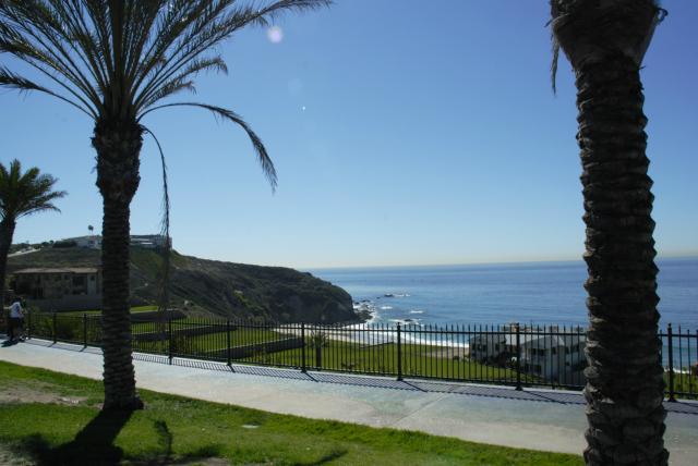 Furnished long term rental-OCEAN VIEW upstairs LARGEST three bedroom unit. Prime coastal location steps to the Strands beach ocean overlook path and steps to the sand. You can't find a rental closer to the beach for this price! Fully remodeled throughout with new windows, new sliding doors, tile flooring, granite countertops, stone fireplace. Comfortable living with ceiling fans in all rooms, flat screen tvs in all bedrooms and family room. All appliances included. Washer and dryer inside unit. Outside storage closet includes beach chairs and boogie boards for your fun in the sun all your round! Available starting Oct 1st for a 6 month or longer term.