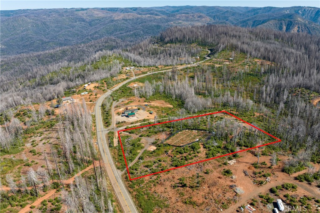 This expansive vacant land, zoned R-1, presents a natural canvas for crafting your dream home in a peaceful and desirable location. With the flexibility of R-1 zoning, you have the ability to create a residence that perfectly matches your vision and lifestyle. Power, septic, 2 wells. Owner will carry with 50% down at 7% term to be negotiated. Give agent a call for more information.