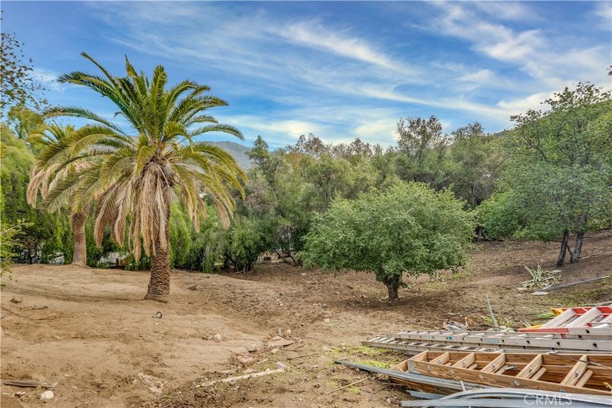 Here is a prime opportunity to buy a house with TWO large lots in South Sunland, located at the end of McGroarty and there are views!. Tax records show that the house is 219 sf and built in 1920. It has all the necessary things- a kitchen, a bathroom, a bedroom and living area-- but it's very compact and needs some TLC for sure. There is water and electricity, and it's connected to sewers. The land has a downslope but there are level areas to build on it.  There is so much potential here for a contractor, developer, or a handy homeowner who wants to create their dream oasis. Parcel 1 is 22,268 sf and has the house on it, Parcel 2 is 18,349 for a total of 40,617 square feet. Both parcels are included in the sale and must be sold together.