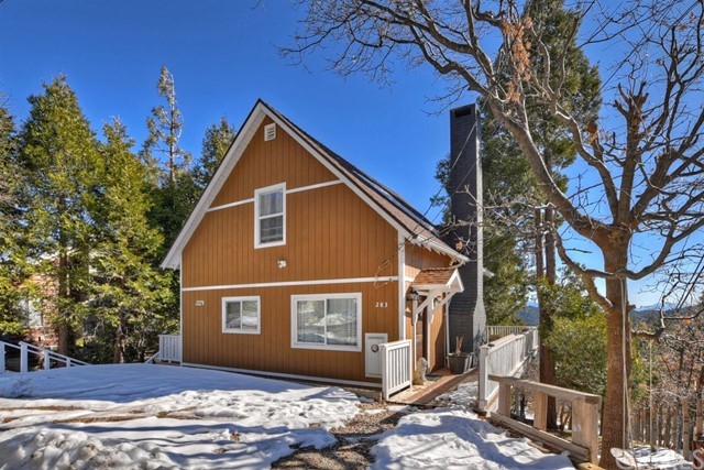 Great escape in Twin Peaks! Fantastic views off of deck. Level entry and parking. Home has an updated feel and light and bright and can come furnished per inventory. Enter into home with bedroom on the main level and bath. Open kitchen and living room with deck off of the main level. Upstairs are two more bedrooms and bathroom plus a bonus loft area, perfect for working at home. Down stairs is a nice bonus area and storage and another deck. This home is a great commuter location too.