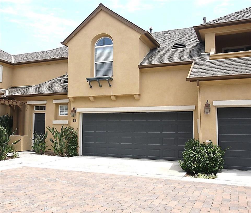 Beautiful Townhome located in much desired Sycamore Grove in Ladera Ranch. 3 Bedroom, 2.5 Bath. Spacious open Living Room with cozy Fireplace, media niche and Dining Room upon entry. Sliding glass door out to a spacious and private backyard. Kitchen opens to the Family Room and offers a breakfast bar, and views out to the patio. Upstairs features 2 secondary bedrooms. Large secondary bath with tub and shower. Large master with mirrored walk-in closet, master bath with dual sinks and soaking tub. Upstairs Laundry Closet, and built-in cabinets. 2-Car Attached Garage. Wonderful community with tree-lined streets, and well-manicured landscaping. Community Pool, and access to all of Ladera Ranch Amenities, including 12 Pools, 4 Clubhouses, Skate Park, Water park, and over 30 miles of hiking and biking Trails.