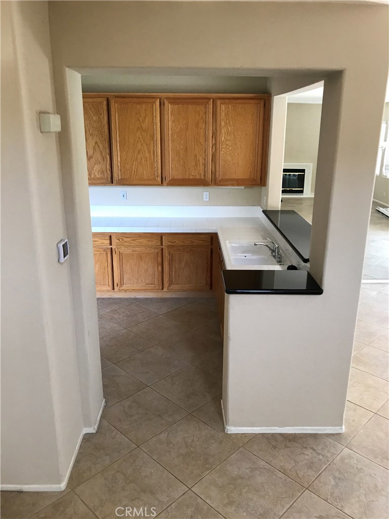 Lovely End Unit Home located in the Andalusia tract of the Prestigious Gated community of Coto de Caza. New Carpet throughout and Gorgeous Large Tile in Kitchen and Dining area. Natural light flows through the house to the Loft area Mirrored wall in dining room and newly installed Rod iron staircase. Granite counters in the Kitchen with an added Wine Refrigerator and storage. Relax in the backyard and enjoy practice putting on the Putting Green surrounded by the Serene setting. You are also in Walking distance to the Coto De Caza Clubhouse and the Park.