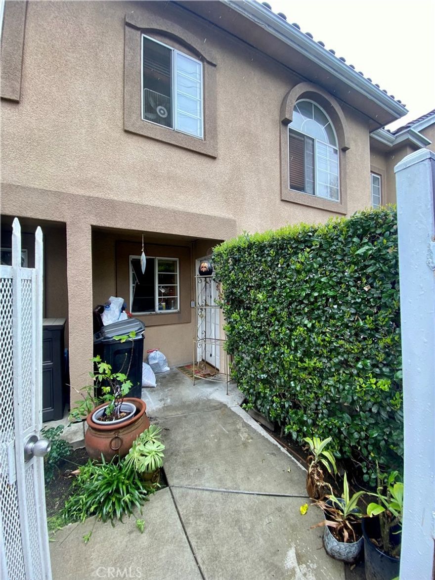 Discover the potential of this spacious 3-bedroom, 2 full bathroom 1half bathroom townhouse awaiting your vision and creativity. With its generous layout, ample natural light, and versatile spaces, this home has great potential to be transformed into a stunning residence. Features include three well-sized bedrooms, three bathrooms, and a layout that can accommodate various design ideas. While repairs and updates are needed, the property offers a blank canvas to create a home tailored to your taste. Easy access to 405 FWY.