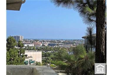 BEACH CLOSE...Upgraded condo with balcony ocean and trees views. This 2 master suite condo ideally located near the ocean, shopping, Hoag Hospital, Fashion Island, South Coast Plaza and freeways. Enjoy a serene resort lifestyle from this desirable inside tract location not backing to a busy street. If you are the sporty type, it is a short walk or bike ride to shopping at Lido Island Village or the beach and Peninsula. this lovely comfortable condo features many upgrades including a beautiful kitchen boasting a very tasteful remodel with granite and Venitian Plaster paint, glass front kitchen cabinets, walk in closet in one of the masters & ample storage! Parking is never a problem with two deeded spots, one is tandem giving you three underground parking spaces. Ideal for a young couple, roommates, or a second home. Always fresh ocean breezes! Includes refrigerator, indoor washer & dryer.