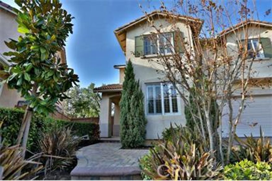 Beautiful single family home located in the highly desirable West Irvine community, offers a downstairs bedroom and 3/4 bathroom, oversized lot! Interior upgrades include gorgeous wood floors, high volume foyer, recessed lights, plantation shutters & slider, central A/C, inside laundry, and a 7 speaker dream sound system w/Pioneer TV! Maytag refrigerator, 6 ceiling fans. Interlocking paver driveway, rear patio, and walkways! The rear yard features block walls and vinyl fencing, artificial turf yard w/professionally landscaped plants/trees/outdoor lighting, BBQ station featuring infrared grill/rotisserie/side burner/refrigerator, and an enchanting glass rock fire pit! Great for entertainment and family gathering. winning Orchard Hills and Beckman schools, close to Parks, Tustin Marketplace, 

hiking trails, and all major transportation corridors!