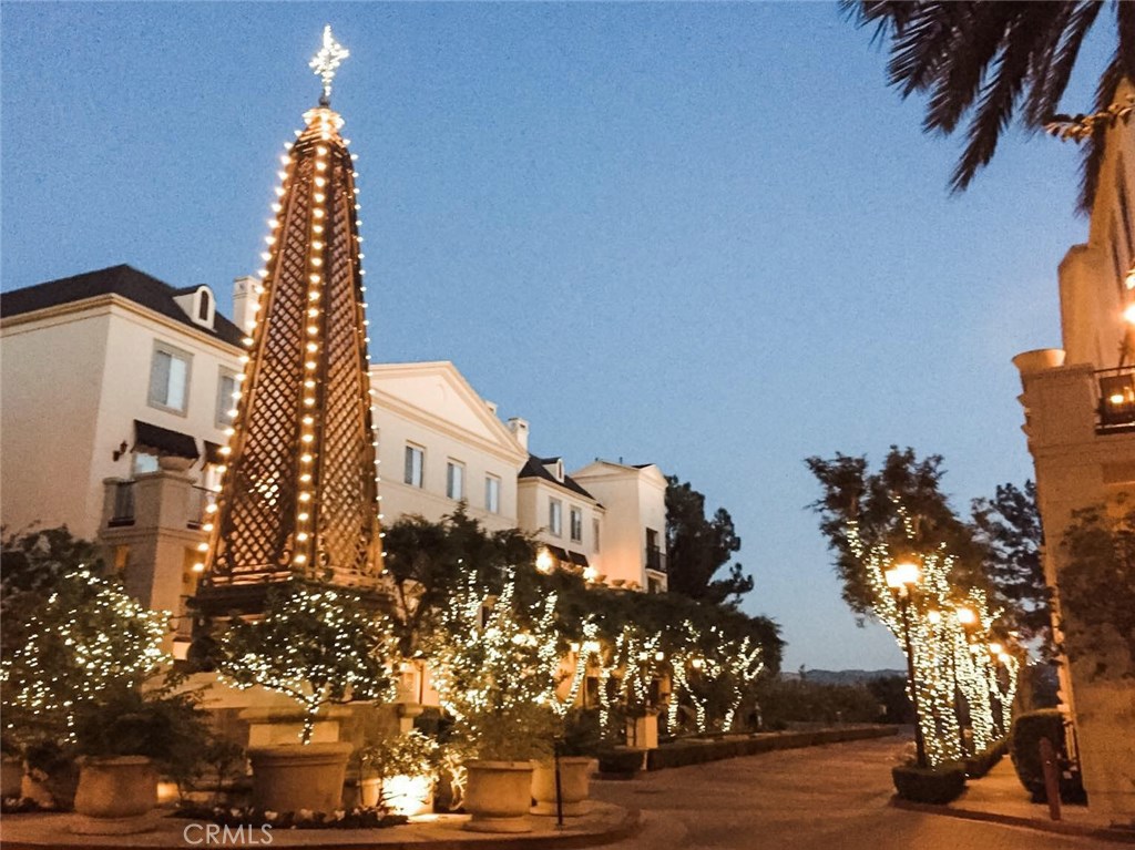 Live your best life in a luxurious and charming European setting in the heart of a city. With a tree-lined drive reminiscent of Paris’ Champs Elysees bordering the San Joaquin Marsh & Wildlife Reserve, you’ll enjoy a peaceful, picturesque homecoming every evening. You’ll never want to leave your own special sanctuary, but should wanderlust beckon, prestigious gated Watermarke Place boasts jet set access to John Wayne Airport (SNA) and local freeways.
Secure, friendly community with convenient remote access & parking for guests, a reserved parking space on your level means you do not need to use the conveniently located stairs or elevators unless you choose to walk down to the elegant clubhouse & business center or gym. The gorgeous main pool has a reputation of its own.
The Penthouse location of this unit grants peekaboo views of the San Joaquin Marsh from the sizable balcony and excellent WiFi reception to Work From Home. For those Zoom meetings, your enviable backdrop is a choice between beautiful double French doors opening out from your den/office onto the elegant balcony, or when closed, jacquard drapes delicately framing a panoramic view of your fab Cali life.
Plush, posh light carpeting compliments the accented wainscoted living and dining area to add a little sophistication to your living space while function is served by Whirlpool Stainless Steel appliances from the well-appointed kitchen, complete with custom wood cabinetry.
We invite you to visit!