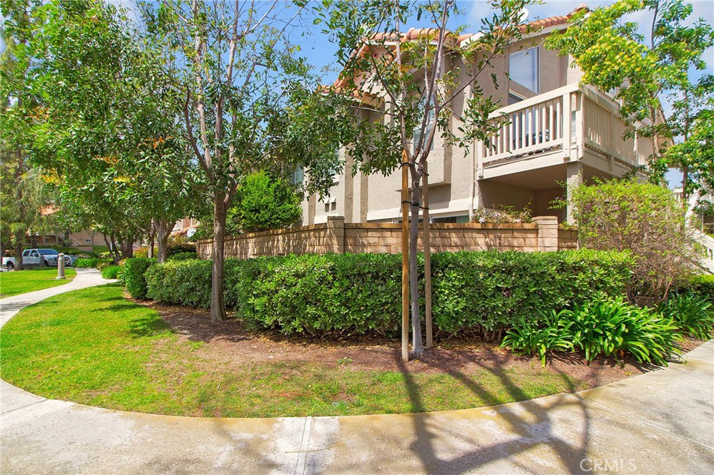 Wow, this two bedroom gem is nestled in the foothills of Trabuco Canyon and picture perfect. A ground floor unit with a charming brick patio and a garden large enough for the weekend gardener. You'll be thrilled with the completely remodeled kitchen, stunning hardwood cabinets, impressive granite, and stainless appliance packet, including a refrigerator! Brand new carpet and a partially remodeled bath add to the list of great features. The windows have been replaced with dual pane and that is huge!! No chilly evenings in this home thanks to the cozy fireplace. Direct garage access makes bringing in the groceries a breeze. Check-out the pools, local parks, and take a moment to appreciate the stunning mountain backdrop.