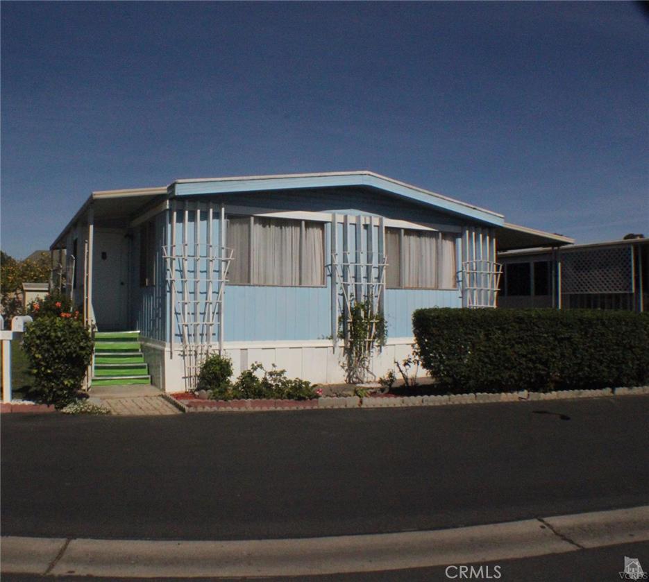 Spacious 2 bedroom, 2 bathroom mobile home located at the Colony Mobile Home Park. Large and open kitchen flows nicely into the dining area and living room. One bedroom with it's own bathroom. Indoor laundry. Community club house and pool area. Park is gated. A Must See!