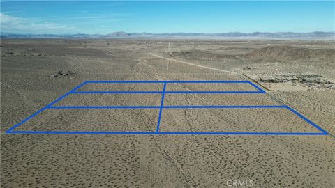 Photo of 0 Sunfair Road, Joshua Tree, CA 92252 (MLS # SB24059460)
