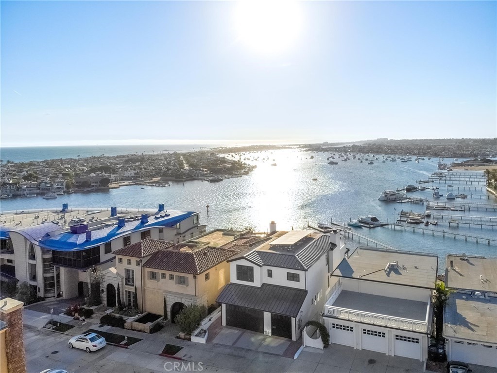 Location! Location! One block from China Cove. Steps to ocean and CDM beach. Light and bright with an open floor plan. Lovely living room with fireplace. Main level has a formal dining room, kitchen w/pantry and two generous bedrooms and bath. Hardwood floors. Spectacular, spacious master suite on upper level is private with view of harbor and ocean. Master bath has Jacuzzi style tub and skylights. Enjoy coffee in the morning and sunsets in the evening on the private patio/deck off master. Private single car garage plus carport for convenient parking. Walk to Big Corona Beach, the farmer's market, extraordinary shopping and incredible restaurants. Enjoy the CDM lifestyle and beach living.
