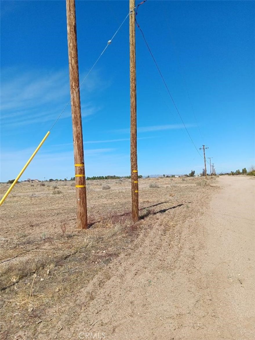 [1] Excellent Investment for the developer. [2] 34.44ac. Residentials lot in Phelan with Water and power in the middle of Custom Houses. [3] 1 acre's   zone as of now, but you can apply for RS-1, the former owner tried this, but he left this property in the middle of the process before this application was approved. 

 the Railroad is running one corner of the property as a boarder.