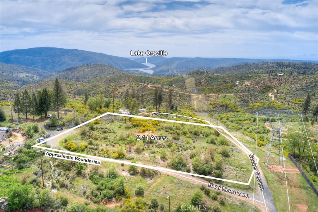Land Ownership Opportunity! OWNER MAY FINANCE with easy down and simple terms! Countryside 2.11+/- acres situated just up from the base of the Sierra Nevada foothills. Just over from Hwy 70, take a stroll past Easy Liven Road and out off Hard Times Lane where you’ll find this chunk of ground. Land is scattered in shrubs, natural foliage and a few trees with plenty of room for a new build, manufactured home or a weekend camp site. A prior 2,109sf home stood here at one time which was taken by fire. All debris have been cleared leaving an old home pad site. A SEPTIC TANK and WATER WELL remain on this land of unknown condition. Easy access to power just over which connected to home at one time. Someone's loss can become your gain. Whether it be for development purposes, or buy and hold for a place to pay into building equity in a land acquisition. Assuming you had the seller carry the loan here, each payment buys down the principal building equity. This in a sense is creating a forced bank account and investment in your future sinking your hard earned money into a personal investment. What better way to get ahead, than real estate! Ask your agent for owner finance options being offered by the seller here. Great potential for the right mindset.