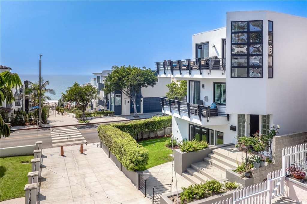 Experience unparalleled elegance and sophistication at 301 16th St, a stunning 6-bedroom, 7-bathroom residence offering over 6,289 square feet of meticulously remodeled living space. This home is located on a coveted corner lot on a walk street in Manhattan Beach's prestigious Sand Section. Designed with luxury in mind, the home features five Balconies that provide breathtaking Pacific Ocean views, spacious patios, and an enclosed yard ideal for both relaxation, entertainment and privacy.
The interior showcases two state-of-the-art gourmet kitchens, perfect for the culinary enthusiast or for hosting lavish gatherings. The three-story elevator seamlessly connects all levels, adding convenience and accessibility throughout the home. Additional highlights include dual sets of washers and dryers that ensure functionality and ease, and over 7 parking spaces with 5 in private garages—an exceptional amenity in this sought-after area.
The primary suite serves as a tranquil retreat with panoramic ocean views, a spa-like en-suite bathroom, and ample closet space. Each additional bedroom is generously sized, offering en-suite baths and custom finishes.
Located just one block from the beach, this residence is the epitome of Southern California living. Enjoy the vibrant Manhattan Beach community with its upscale dining, shopping, outdoor activities and exceptional schools all while retreating to your private luxurious sanctuary.